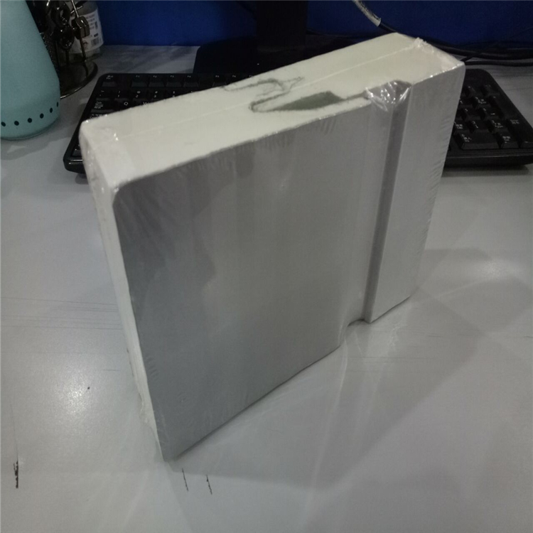 PU sandwich panel edge profile showing the tongue-and-groove joint